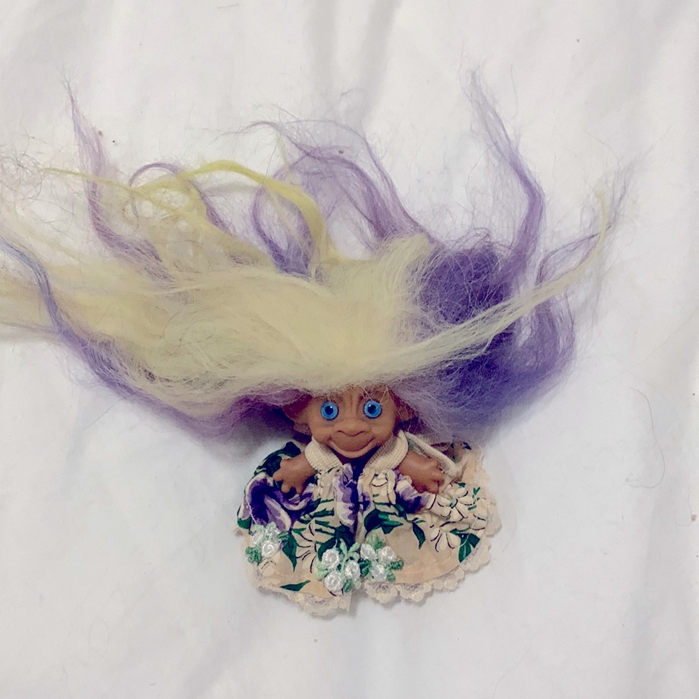 Vintage troll doll with purple flower dress